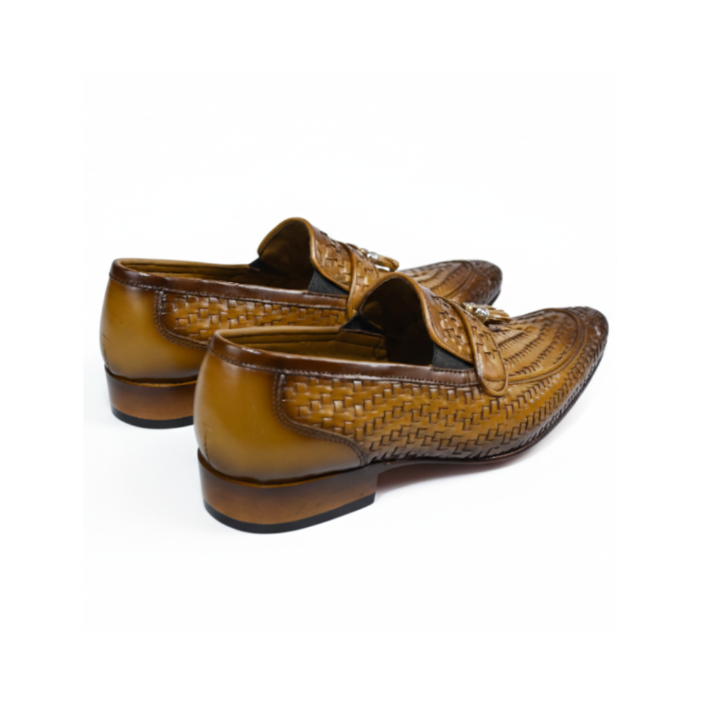 Pair of brown loafers with woven pattern on a white background