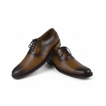 Pair of brown ldress shoes on a white background