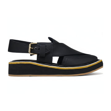 Black peshawari cahppal with a gold buckle on a white background