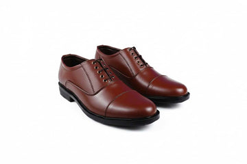 A pair of men's brown oxford shoes with black soles, displayed on a clean white background.