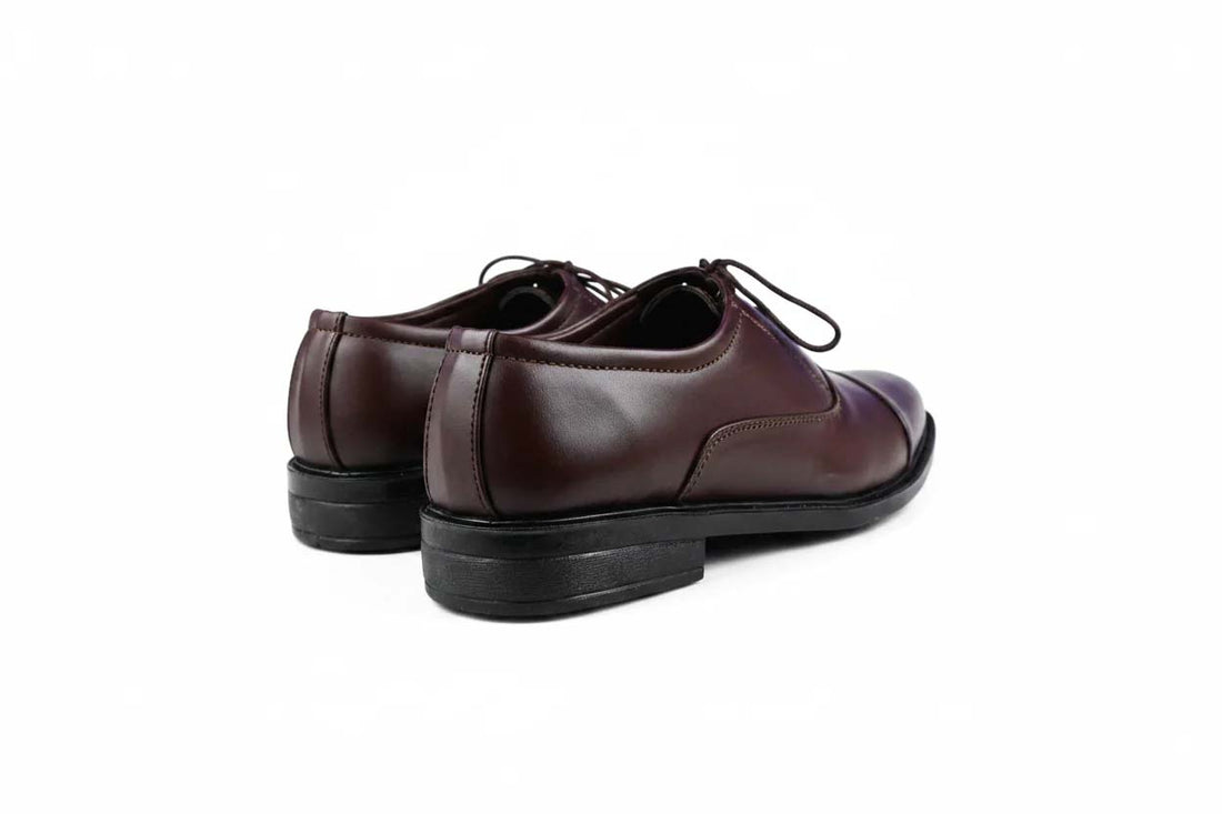 A pair of men's brown oxford shoes with black soles, displayed on a clean white background.