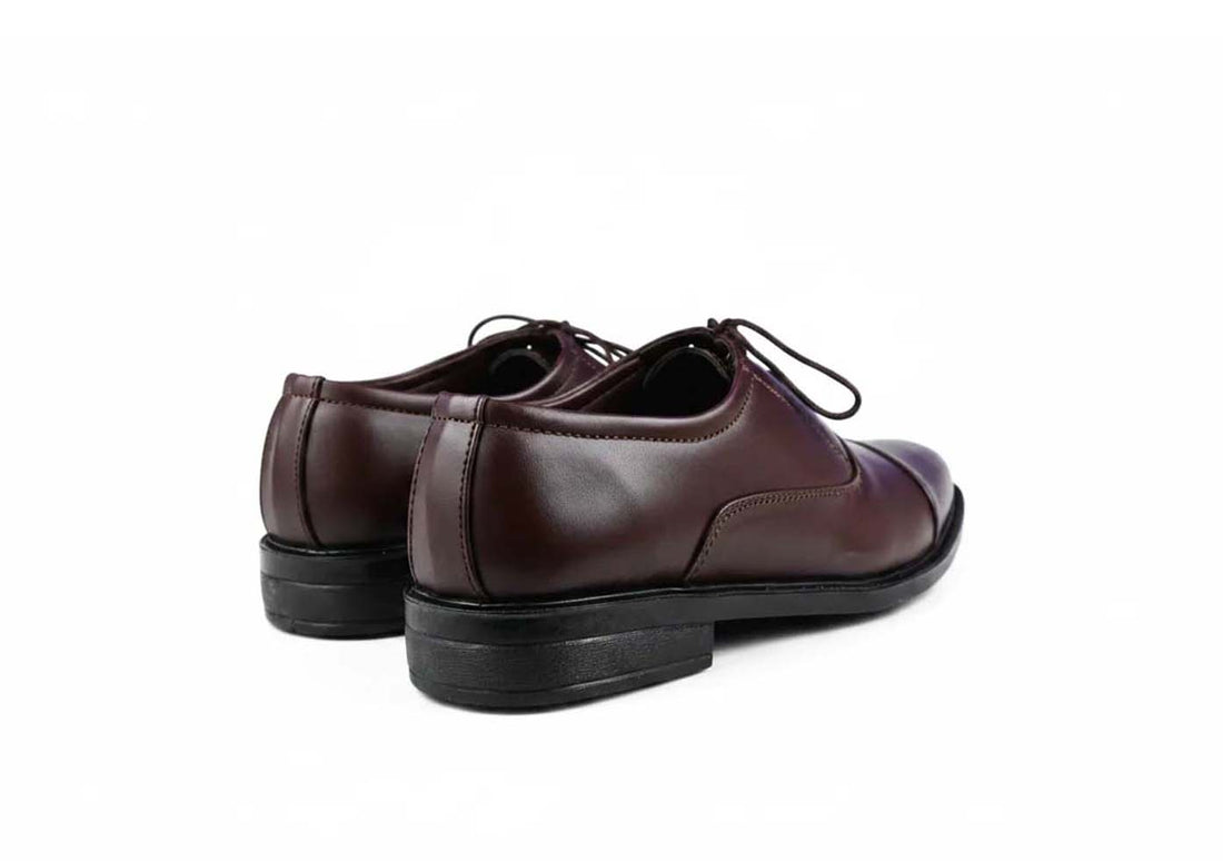 A pair of men's brown oxford shoes with black soles, displayed on a clean white background.