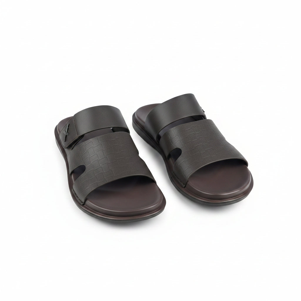 Black sandals with a unique sole design on a white background