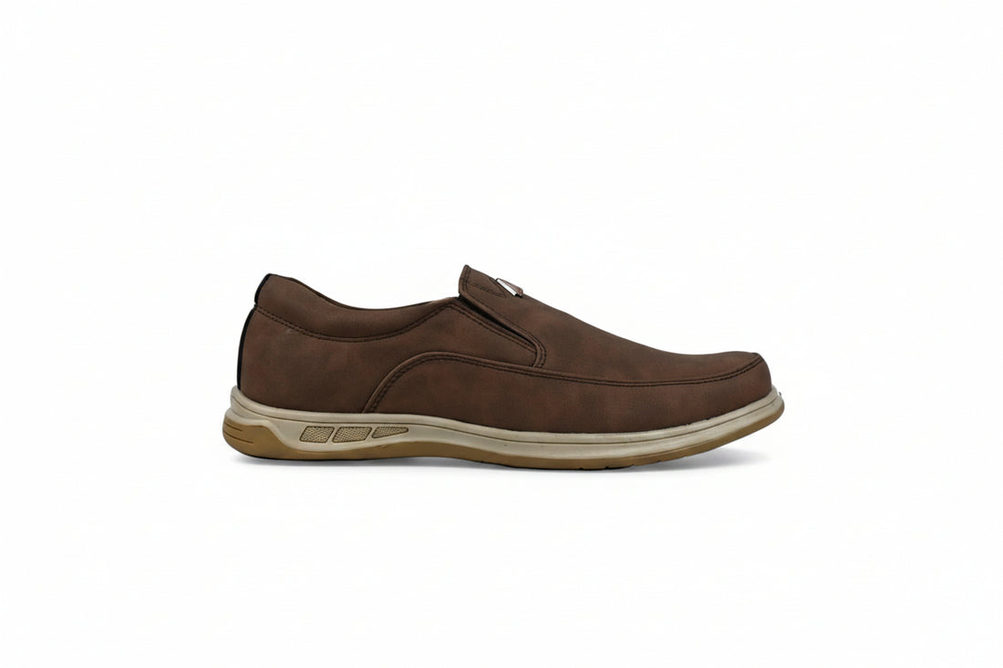 A pair of men's slip-on loafers in brown suede, featuring a small red geometric logo on the side and a beige midsole, set against a plain white background.