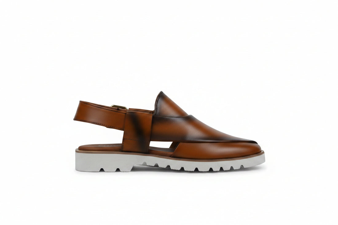 A pair of black slingback clogs with brown lining and a white lug sole, shown on a clean white background.