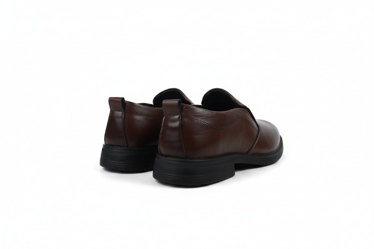 A pair of dark brown slip-on loafers shown from the rear three-quarter view on a clean white background.