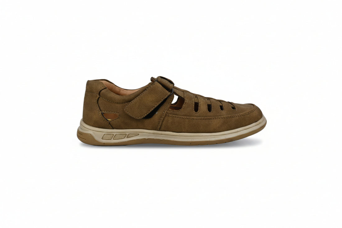 A pair of brown  slip-on shoes with decorative laces and beige soles, photographed on a light gray fabric background.