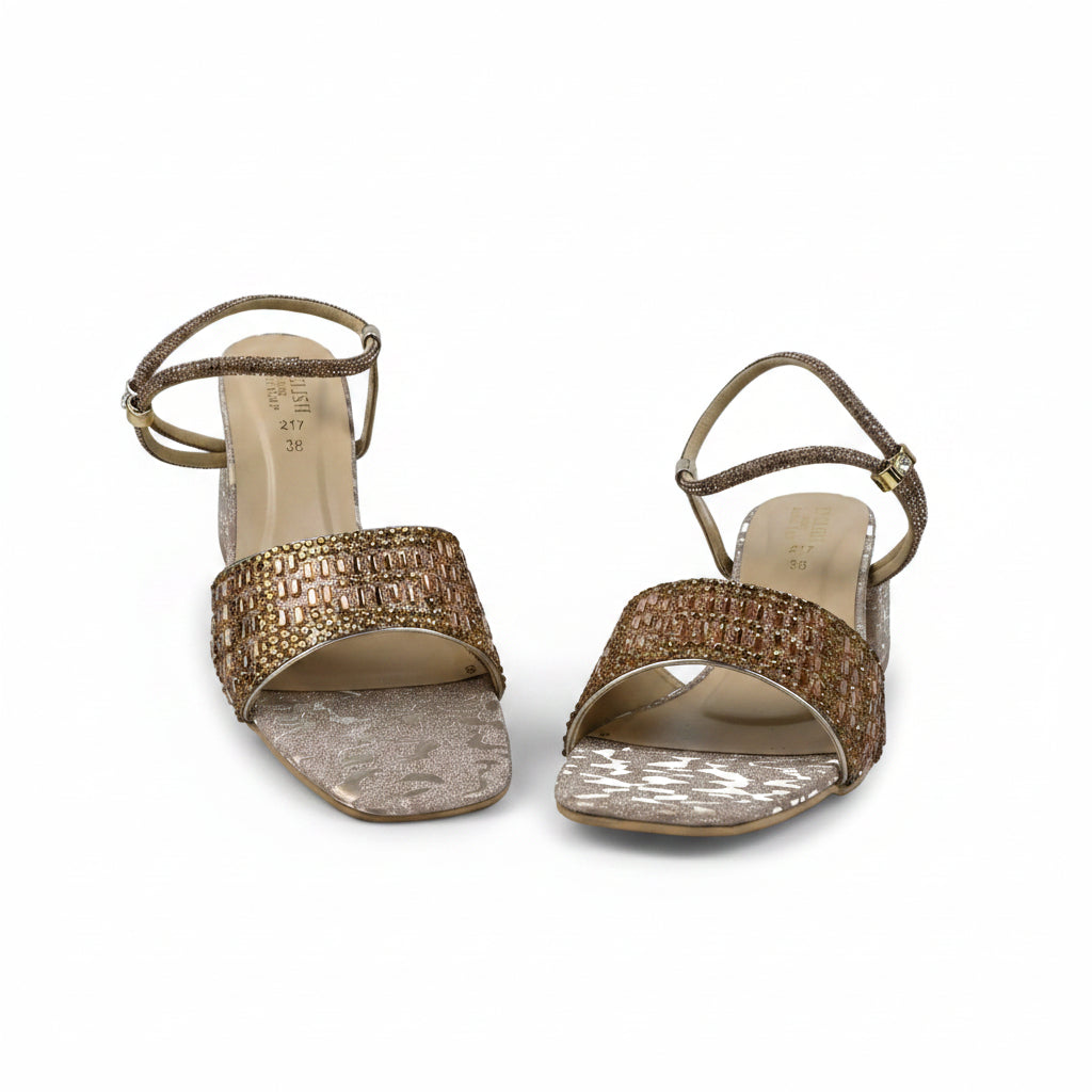 A pair of women's heeled sandals with metallic gold woven straps and square toes, shown on a light gray background.