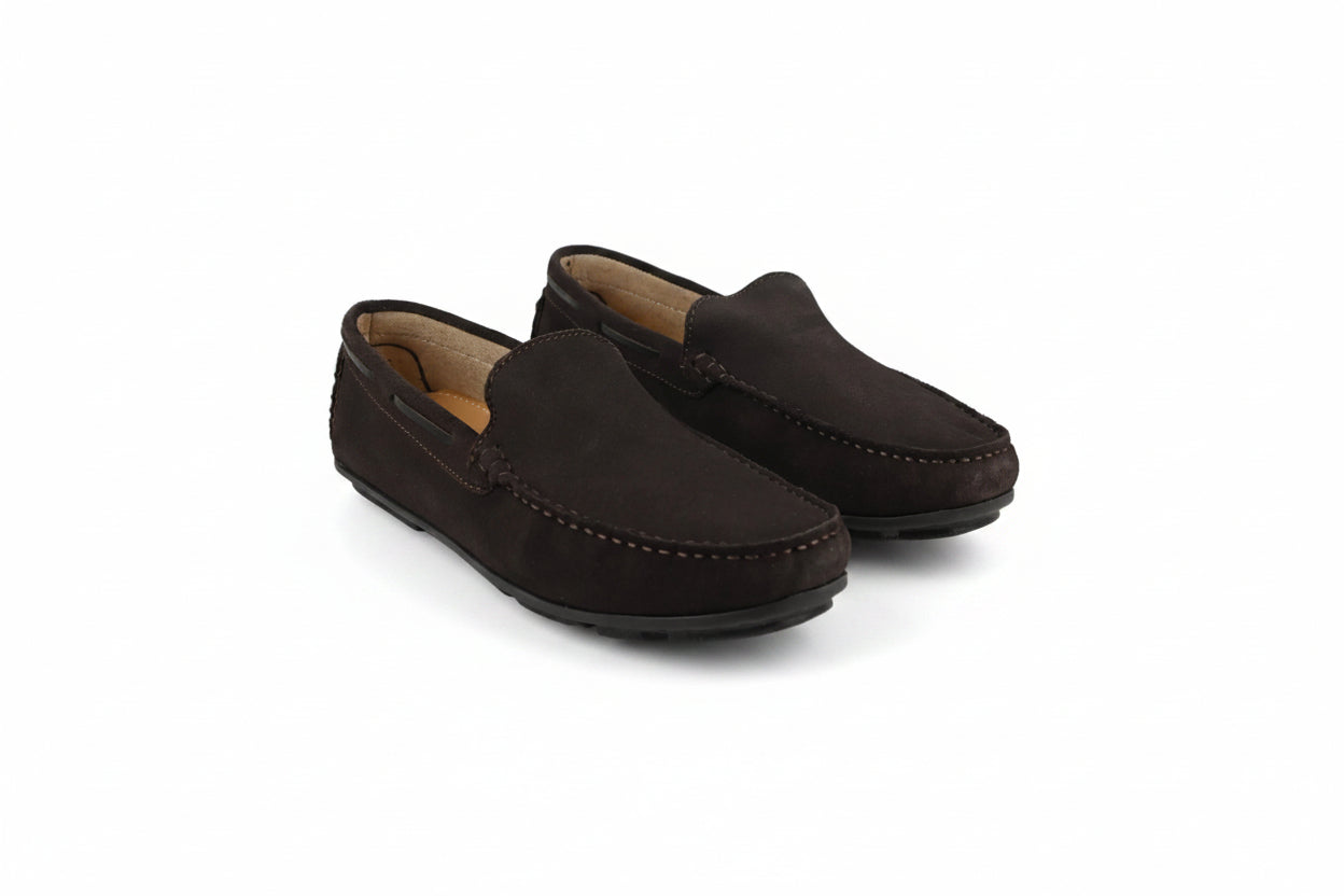 A pair of dark brown suede driving loafers shown on a white studio background.