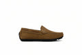 A tan suede moccasin loafer with white contrast stitching and a black rubber sole, shown in profile against a white studio backdrop.