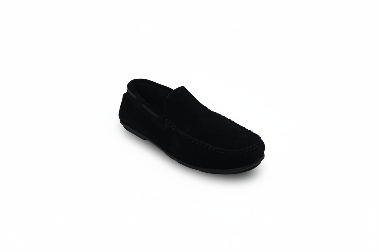 A single black suede moccasin loafer shown from a side profile on a white studio background.