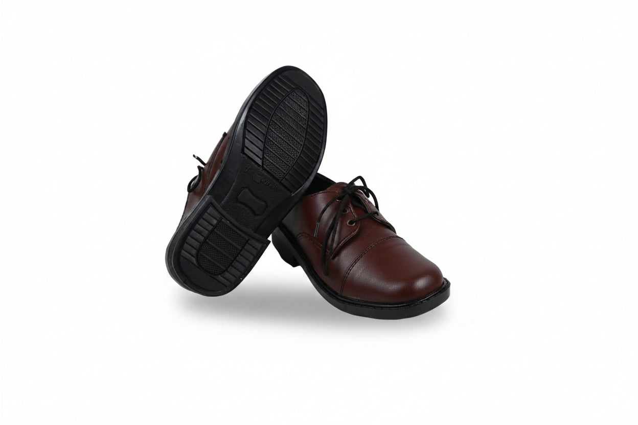 A pair of dark brown leather lace-up shoes with black soles, one standing upright and the other tilted on its side to show the tread, set against a plain white background.