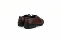 A pair of men's brown leather lace-up shoes with black soles, shown from a side-rear angle on a white studio background.