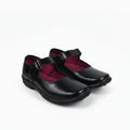 A pair of black Mary Jane school shoes with magenta pink lining, shown on a white studio background.