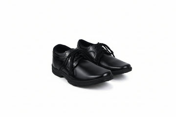 A pair of black leather lace-up dress shoes photographed on a plain white studio background.