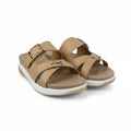 A pair of women's slide sandals in tan with white soles and gold-tone buckle details, shown on a plain white background.
