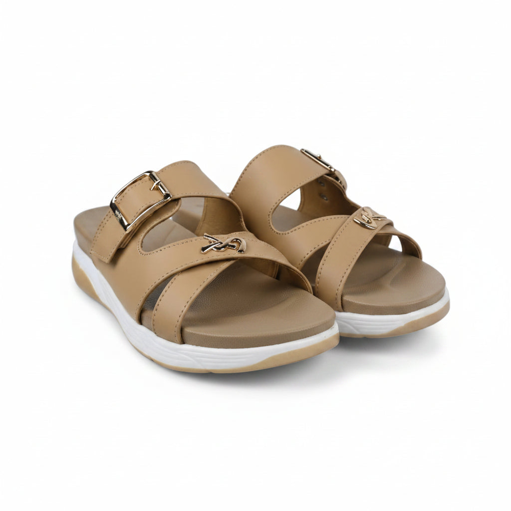 A pair of women's slide sandals in tan with white soles and gold-tone buckle details, shown on a plain white background.