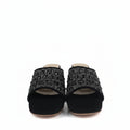 A pair of black velvet slide sandals embellished with intricate silver rhinestone patterns across the straps, shown against a plain white background.