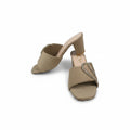 A pair of beige open-toe mule sandals with block heels, featuring one sandal with a plain strap and the other with a decorative rhinestone-embellished strap, set against a white studio background.