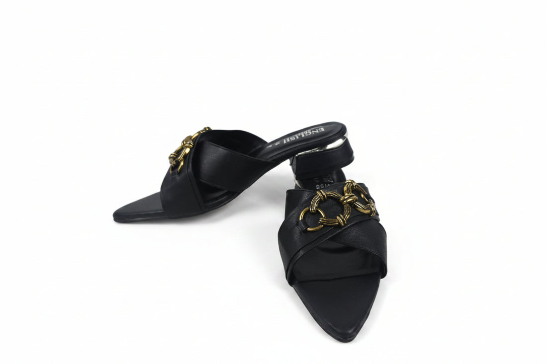 A pair of women's brown leather slide sandals with chunky chain-link straps and a low block heel, displayed on a light gray studio background.