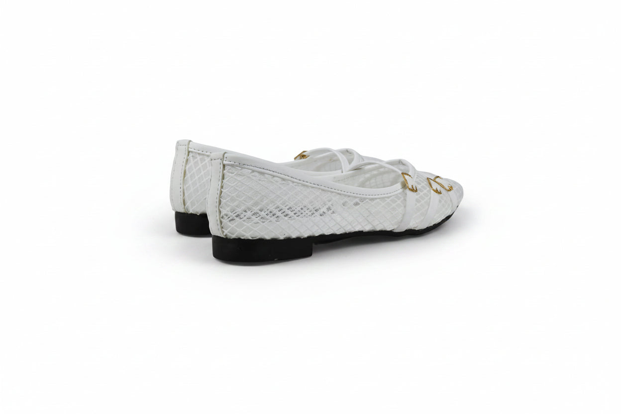 A pair of white woven leather ballet flats with gold-tone hardware and white laces, shown from a side-rear angle on a light gray background.