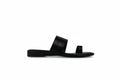 A single black leather slide sandal with a wide strap and a small toe loop, shown in profile against a light gray background.