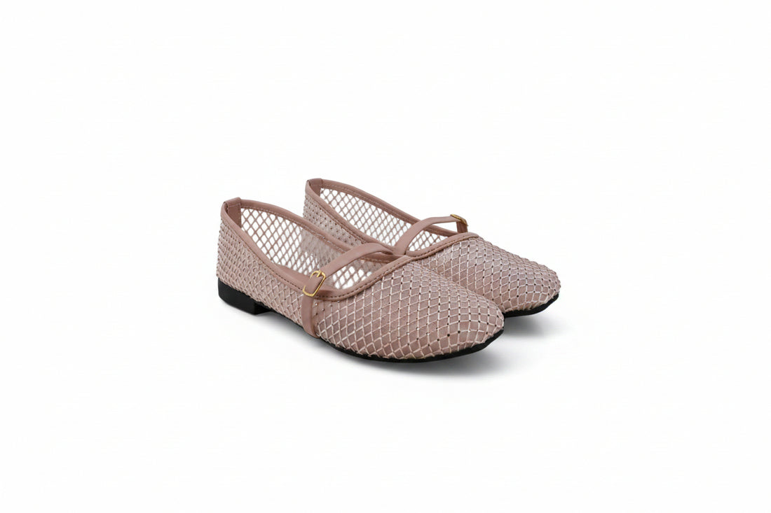 A pair of women's flat shoes with a pink mesh upper, thin straps, and a small gold buckle, shown on a light gray background.