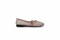 A single women's flat shoe with a pink woven upper, a matching pink strap with a small gold buckle, and a black sole, shown against a light gray background.