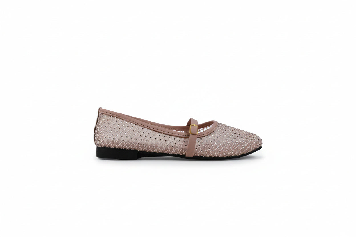 A single women's flat shoe with a pink woven upper, a matching pink strap with a small gold buckle, and a black sole, shown against a light gray background.