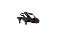 A pair of black leather slingback kitten heel sandals with a signature red sole, shown from a side angle against a light gray background.