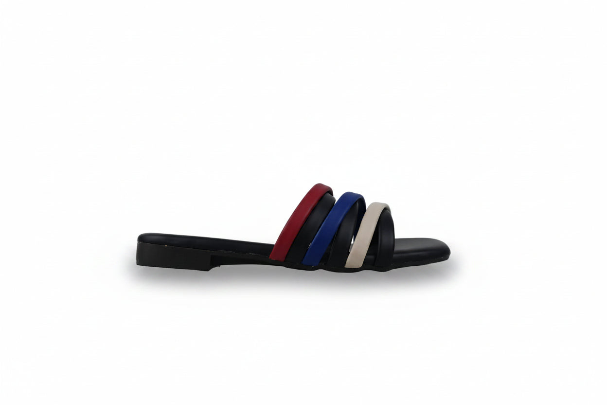 A single black slide sandal with three horizontal straps in red, blue, and off-white, set against a plain light gray background.