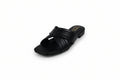 A single black leather slide sandal with crisscrossing straps and a low block heel, photographed on a light gray studio background.
