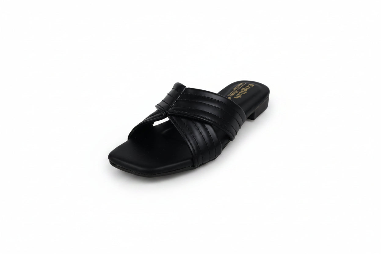 A single black leather slide sandal with crisscrossing straps and a low block heel, photographed on a light gray studio background.