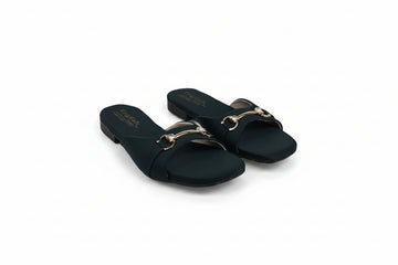 A pair of dark green slide sandals with gold-tone horsebit hardware, displayed on a white studio background.