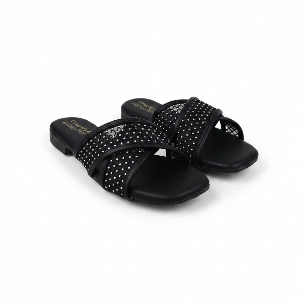 A pair of black slide sandals with multiple wide straps covered in small silver rhinestones, shown on a plain white studio background.