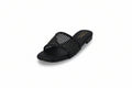 A single black slide sandal with a wide strap embellished with silver rhinestones, shown on a light gray background.