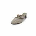 A single women's mule sandal in beige with a fishnet pattern, a low block heel, and a gold-tone chain detail across the strap, photographed on a light gray studio background.