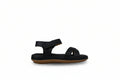 A single black rubber sandal with a brown sole, shown in profile against a light gray textured background.
