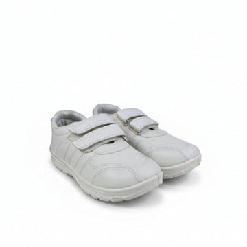 A pair of white children's low-top sneakers with double hook-and-loop straps, shown on a light gray textured studio background.
