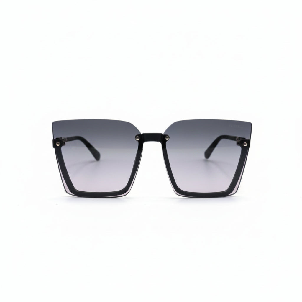 A pair of square-frame sunglasses with a black acetate frame and gradient pink-tinted lenses, displayed on a white surface between two silver studio reflectors.