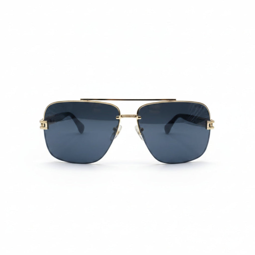 A pair of aviator-style sunglasses with a gold metal frame and dark gray lenses, displayed on a white surface between two textured silver panels.