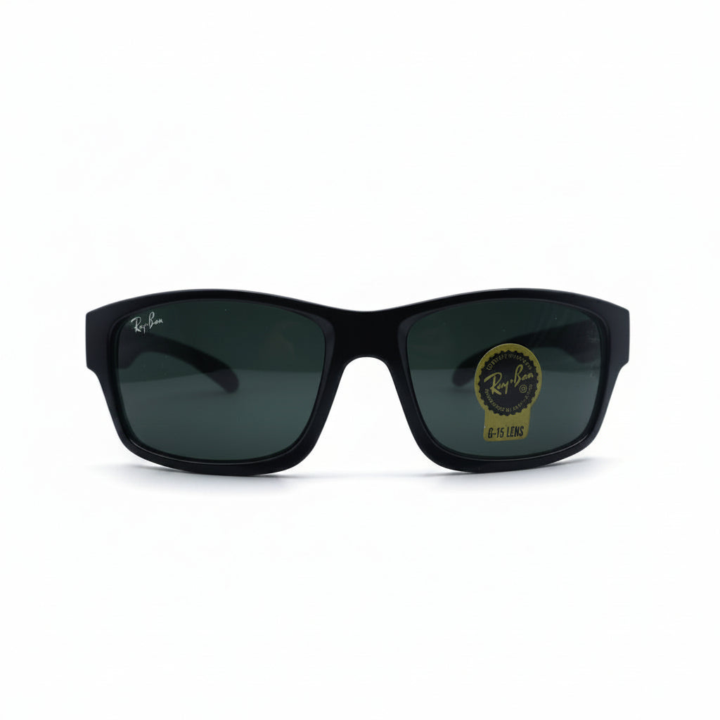 Black Ray-Ban sunglasses with dark lenses, displayed on a white surface with two silver reflective bags on either side.