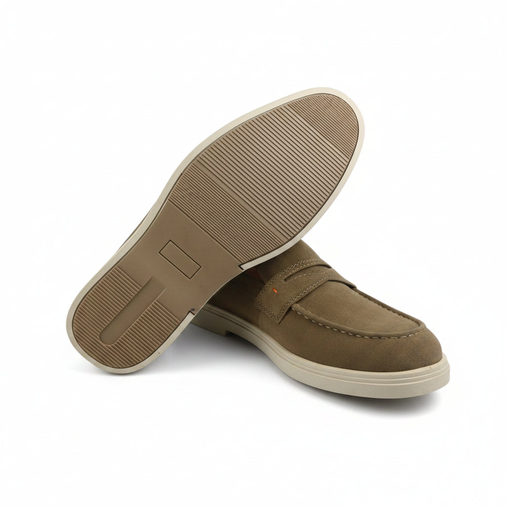 A pair of men's slip-on loafers in brown suede with cream-colored soles, displayed on a white studio background.