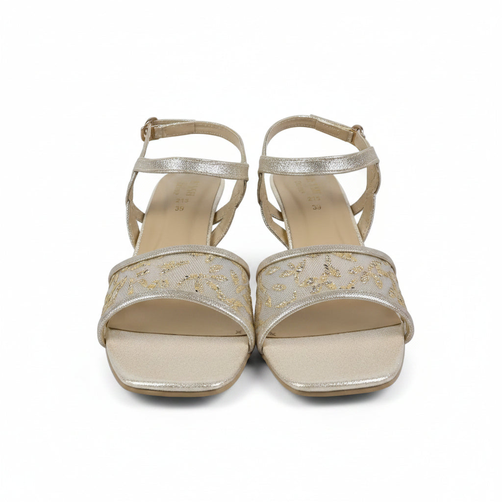 A pair of women's metallic gold heeled sandals with square toes and thin ankle straps, shown against a plain light gray background.