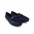 A pair of navy blue leather moccasin-style loafers with silver-tone metal hardware, displayed on a white studio background.