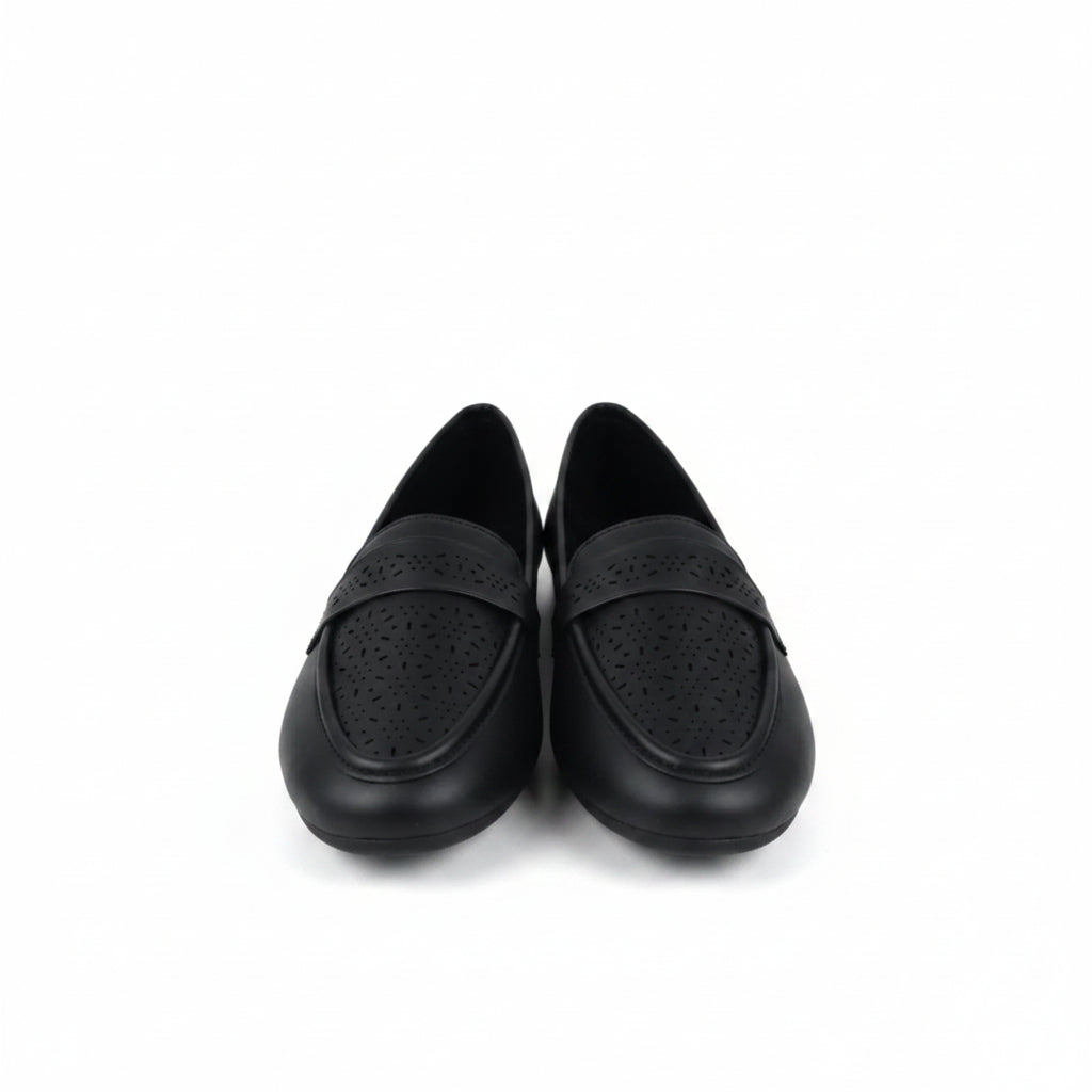 A pair of black leather penny loafers with perforated detailing on the toe straps, displayed on a white studio background.