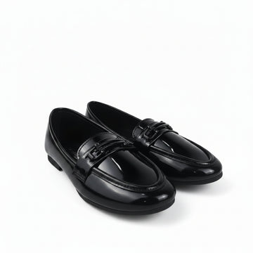 A pair of glossy black patent leather penny loafers with decorative straps across the vamp, displayed on a white studio background.