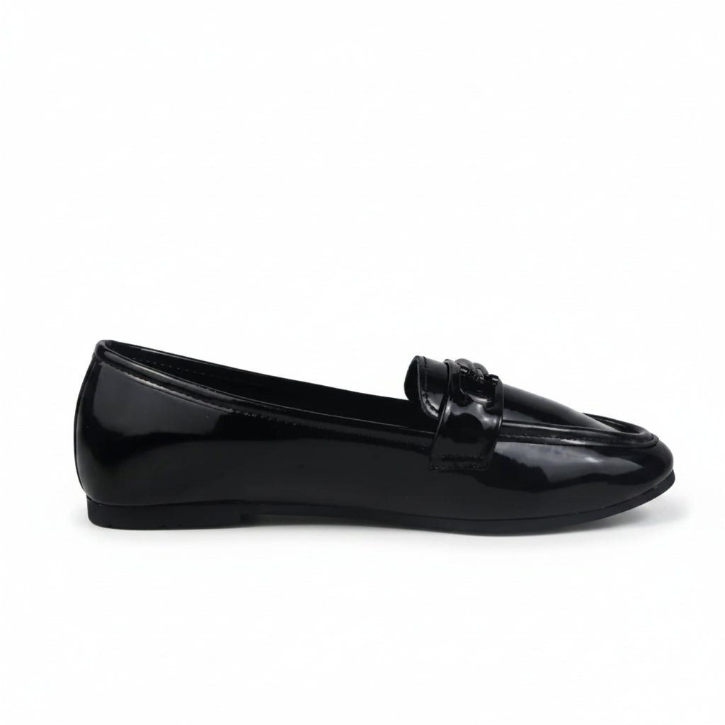 A single black patent leather penny loafer shown in profile against a light gray background.