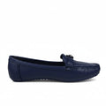 A single navy blue leather loafer with a small metallic horsebit detail on the vamp, photographed from the side against a light gray studio background.