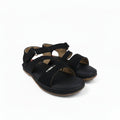 A pair of black platform sandals with textured straps and adjustable buckles, photographed on a white studio background.